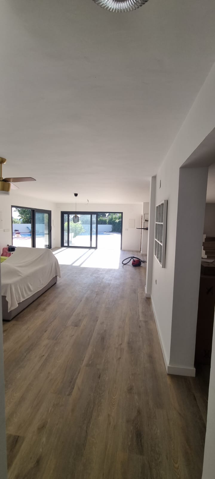 Las Rozas Tarima Vinilica Madera salon antigua2 — Tarima vinílica SPC clic Madrid, Pavimentos Arquiservi