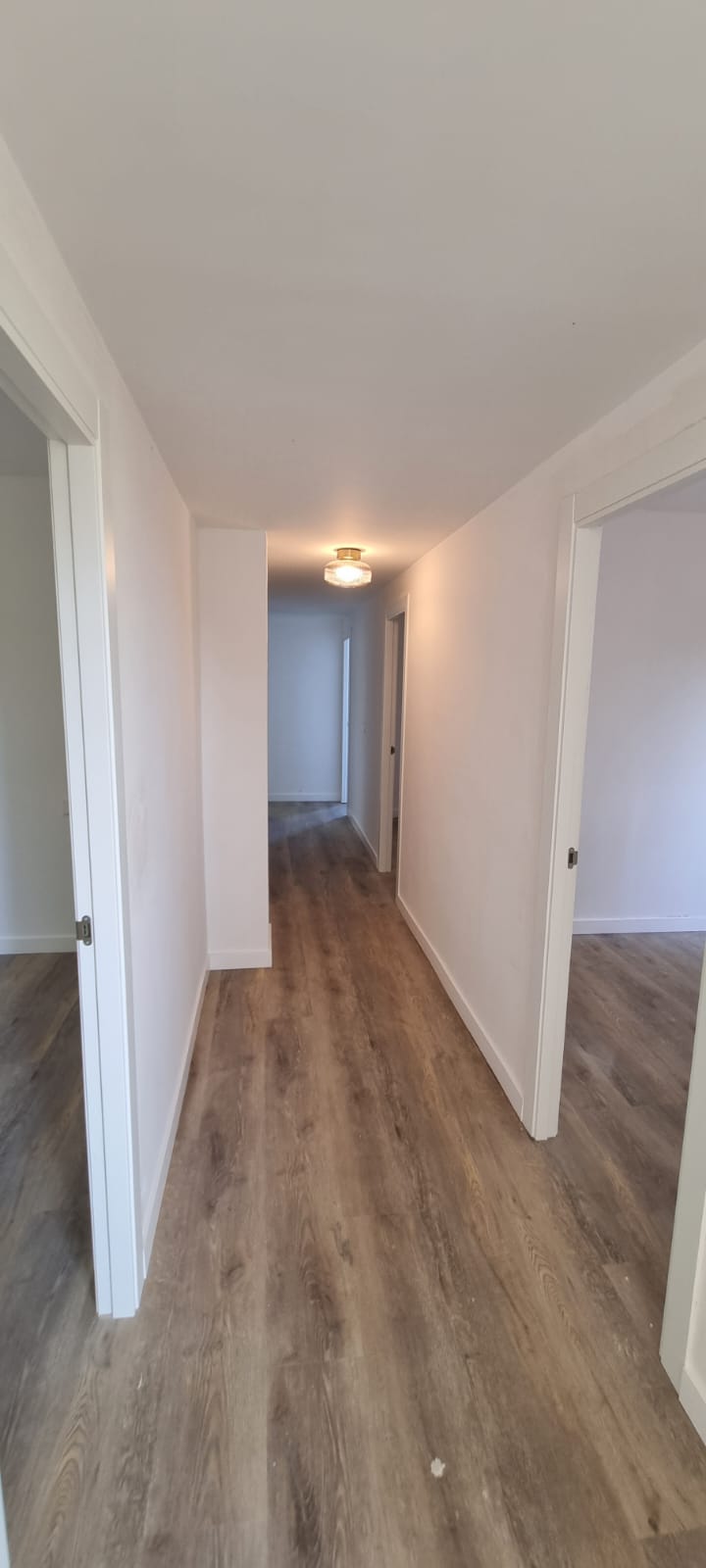 Mostoles tarima vinilica pasillo — Tarima vinílica SPC clic Madrid, Pavimentos Arquiservi