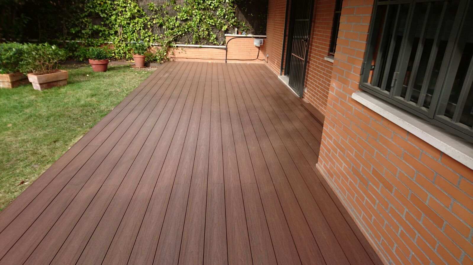 Porche jardin Rivas3 — Tarima exterior Madrid, Pavimentos Arquiservi